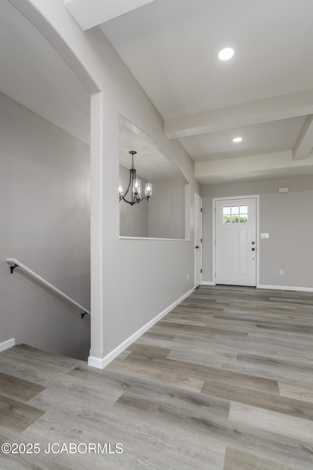 5705 Summerfield Ct, Jefferson City, MO 65109 - entryway with wood finished floors, recessed lighting, a chandelier, and beamed ceiling