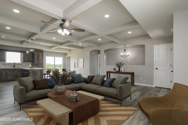 5705 Summerfield Ct, Jefferson City, MO 65109 - living area featuring a chandelier, coffered ceiling, beamed ceiling, wood finished floors, and a ceiling fan