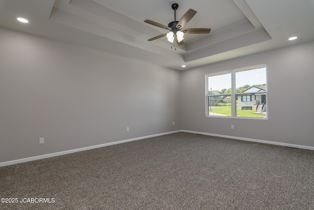 5705 Summerfield Ct, Jefferson City, MO 65109 - carpeted spare room featuring a tray ceiling, recessed lighting, and a ceiling fan