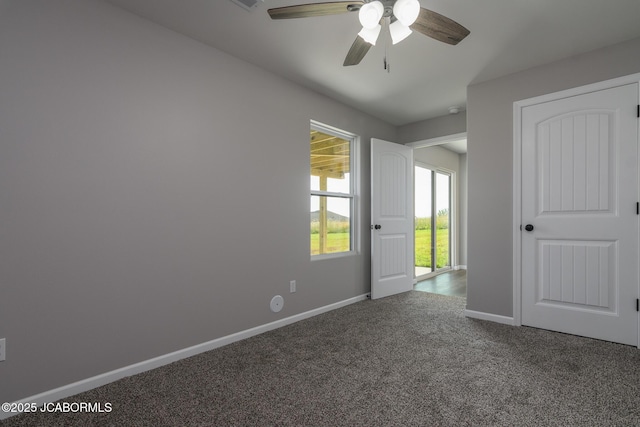 5705 Summerfield Ct, Jefferson City, MO 65109 - unfurnished bedroom with carpet floors and ceiling fan