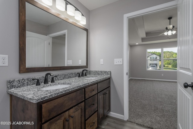 5705 Summerfield Ct, Jefferson City, MO 65109 - full bath with double vanity and ceiling fan