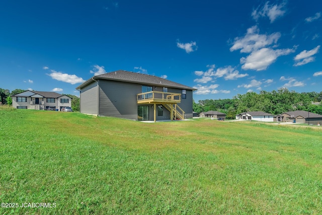 5705 Summerfield Ct, Jefferson City, MO 65109 - back of property with stairs, a deck, and a lawn