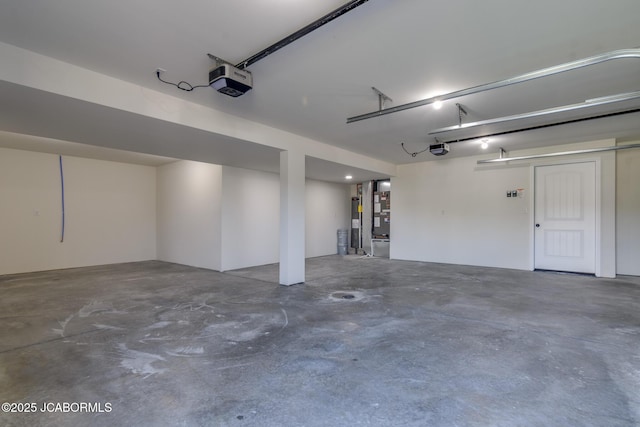 5705 Summerfield Ct, Jefferson City, MO 65109 - garage featuring a garage door opener