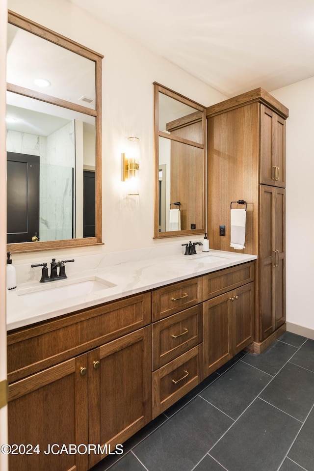 bathroom with vanity and tile patterned floors