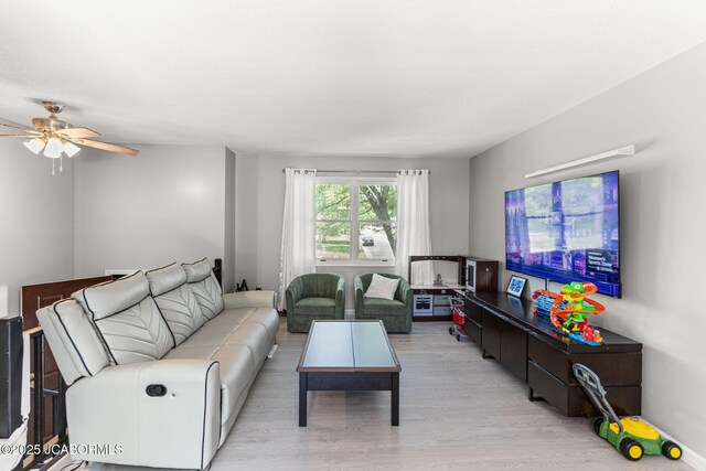 5501 S Brooks Dr, Jefferson City, MO 65109 - living area featuring light wood-style floors and ceiling fan