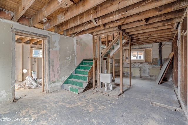 basement featuring stairway