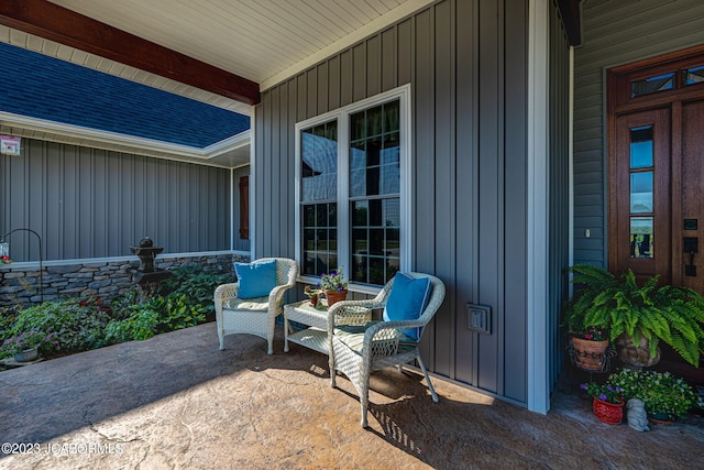 view of patio featuring a porch