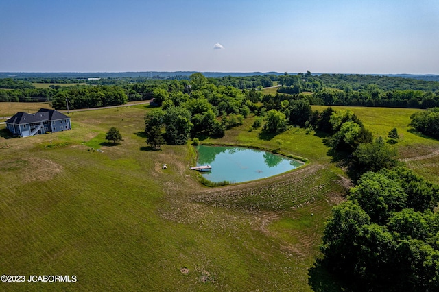 bird's eye view with a water view and a rural view