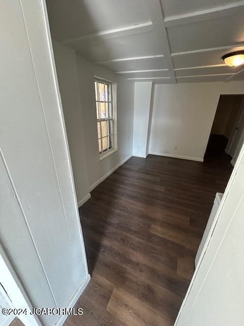 empty room featuring dark hardwood / wood-style floors