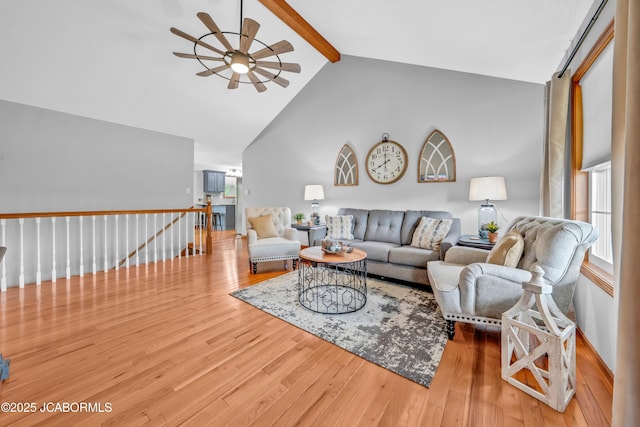 990 Diamond Rdg, Jefferson City, MO 65109 - living room with a ceiling fan, wood finished floors, high vaulted ceiling, and beamed ceiling