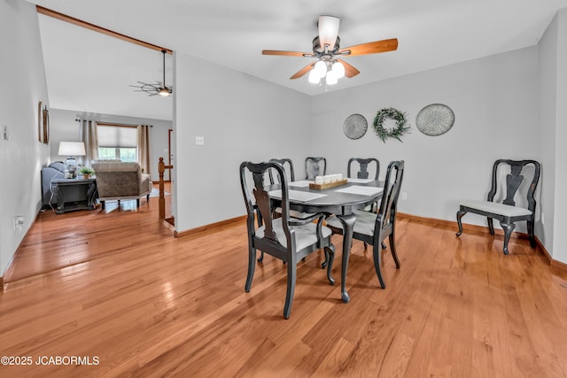 990 Diamond Rdg, Jefferson City, MO 65109 - dining room featuring baseboards, a ceiling fan, and light wood finished floors