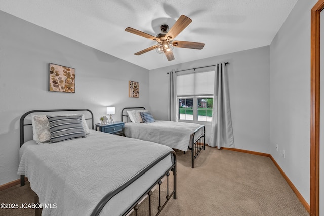 990 Diamond Rdg, Jefferson City, MO 65109 - bedroom featuring a ceiling fan, baseboards, and light carpet