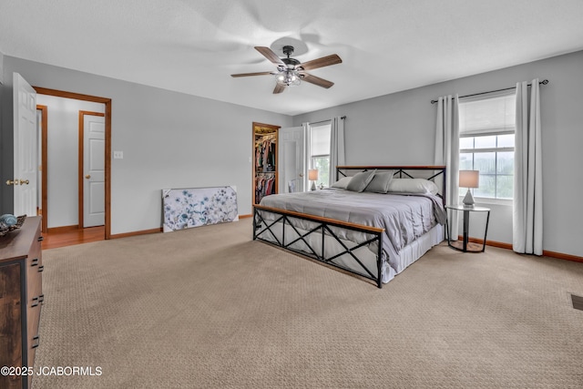 990 Diamond Rdg, Jefferson City, MO 65109 - bedroom with carpet floors, baseboards, a spacious closet, and a closet