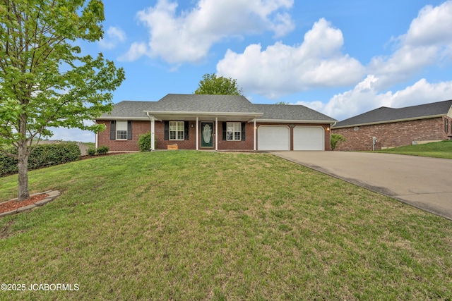 990 Diamond Rdg, Jefferson City, MO 65109 - ranch-style house featuring brick siding, a garage, driveway, and a front yard