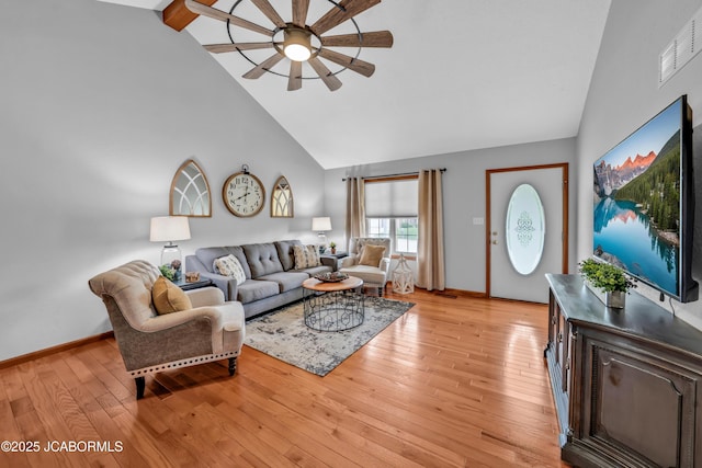 990 Diamond Rdg, Jefferson City, MO 65109 - living room with ceiling fan, high vaulted ceiling, light wood-style flooring, baseboards, and visible vents