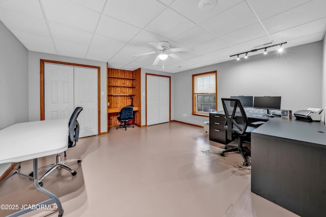 990 Diamond Rdg, Jefferson City, MO 65109 - office area featuring finished concrete floors, a ceiling fan, baseboards, and a drop ceiling
