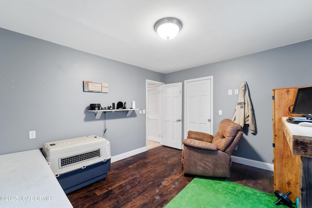 interior space featuring dark wood-type flooring and heating unit