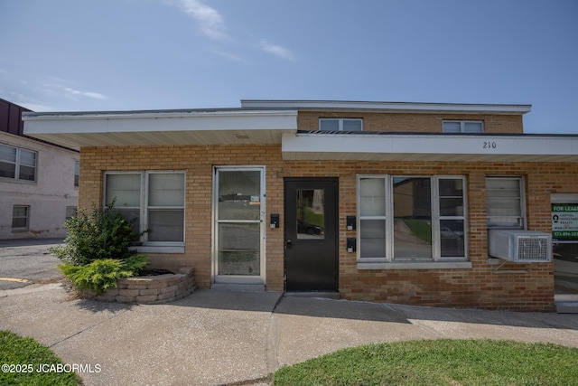 210 E Dunklin St, Jefferson City, MO 65101 - view of front facade featuring brick siding