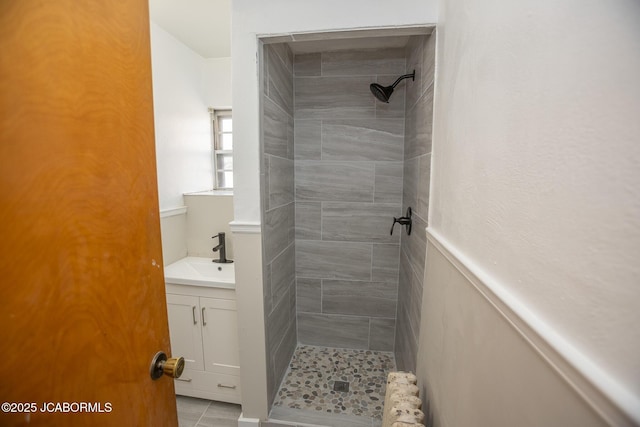 210 E Dunklin St, Jefferson City, MO 65101 - bathroom featuring a shower stall, tile patterned floors, and vanity