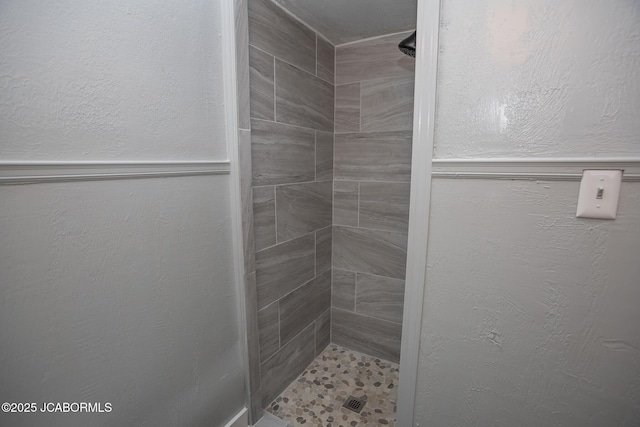210 E Dunklin St, Jefferson City, MO 65101 - full bath with a shower stall and a textured wall