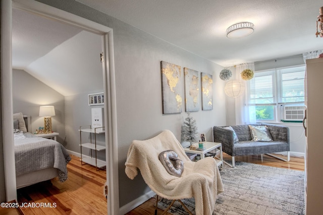 713 S Summit Dr, Holts Summit, MO 65043 - bedroom featuring wood finished floors and lofted ceiling