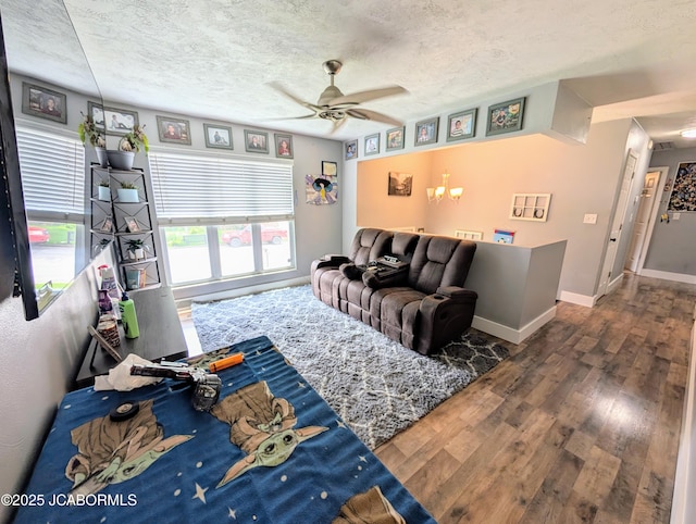 5416 S Brooks Dr, Jefferson City, MO 65109 - living room featuring hardwood / wood-style floors, ceiling fan, and a textured ceiling
