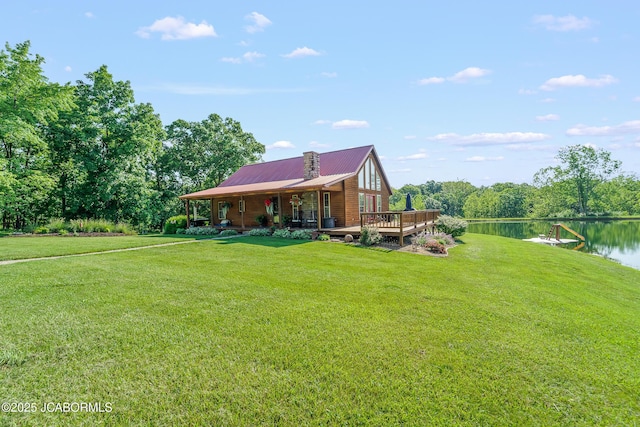 4604 County Rd 115, Fulton, MO 65251 - view of green lawn featuring a water view