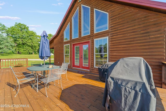 4604 County Rd 115, Fulton, MO 65251 - deck with french doors, outdoor dining space, a lawn, and grilling area