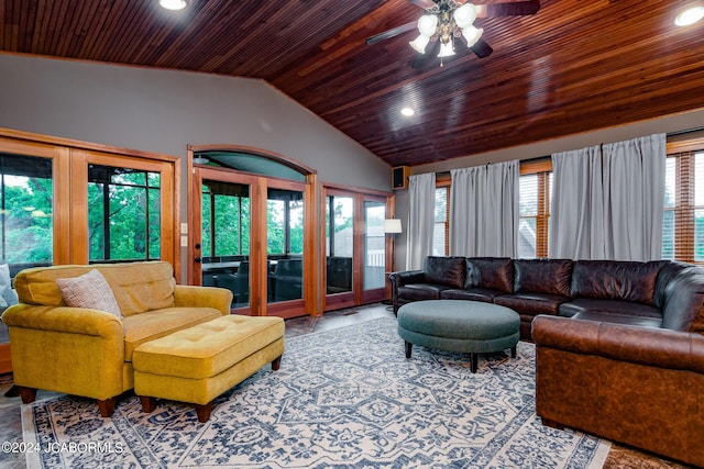 living room featuring vaulted ceiling, ceiling fan, and wooden ceiling