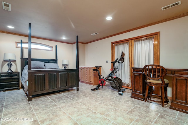 bedroom featuring crown molding