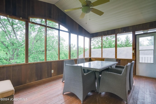 sunroom / solarium with lofted ceiling and ceiling fan