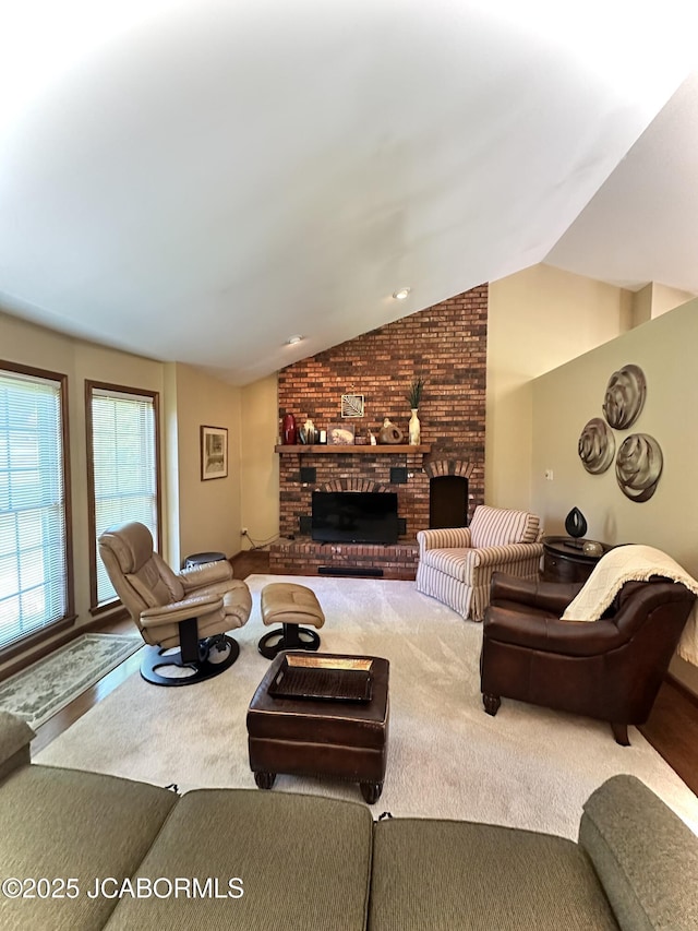 12566 Country View Dr, Tebbetts, MO 65080 - living room featuring lofted ceiling, a fireplace, and carpet floors