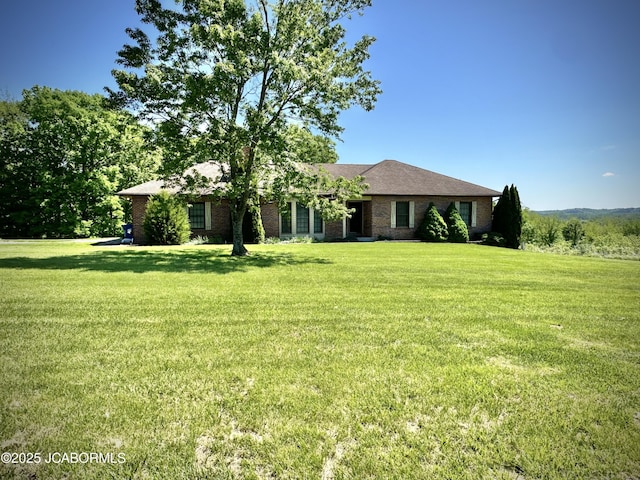 12566 Country View Dr, Tebbetts, MO 65080 - single story home with a front yard and brick siding