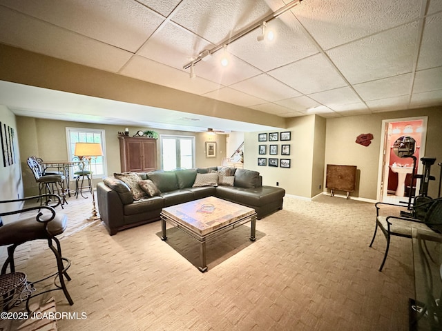 12566 Country View Dr, Tebbetts, MO 65080 - living area featuring carpet flooring, rail lighting, baseboards, and a paneled ceiling