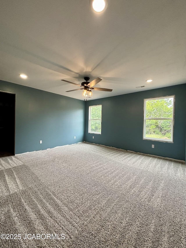 209 Gavin Ln, Linn, MO 65051 - empty room featuring carpet flooring, a ceiling fan, and recessed lighting