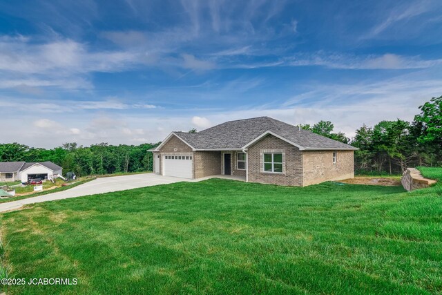 209 Gavin Ln, Linn, MO 65051 - single story home featuring concrete driveway, brick siding, a front lawn, and an attached garage