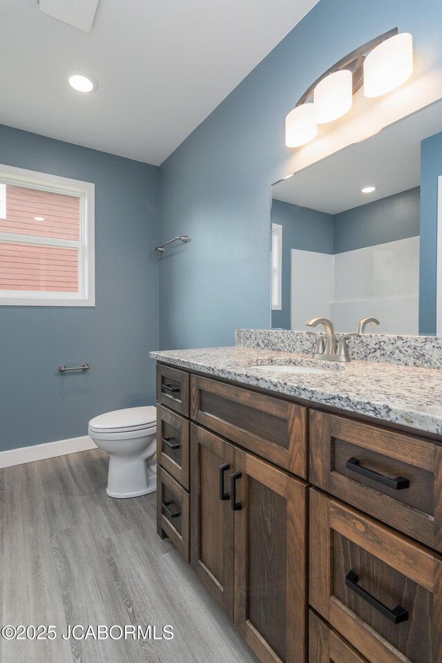 209 Gavin Ln, Linn, MO 65051 - full bathroom featuring vanity and wood finished floors