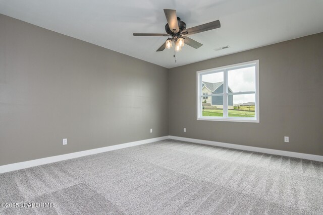 209 Gavin Ln, Linn, MO 65051 - carpeted spare room featuring baseboards and a ceiling fan