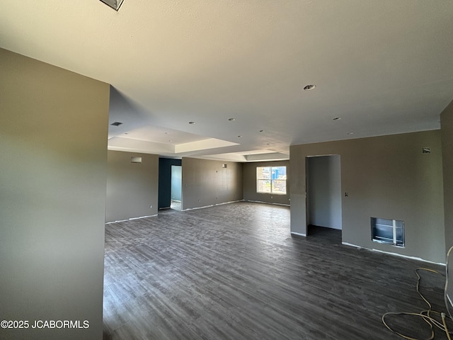 209 Gavin Ln, Linn, MO 65051 - empty room with dark wood finished floors and baseboards