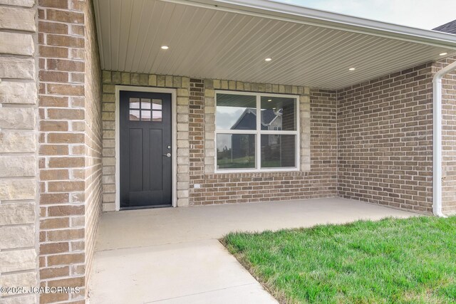 209 Gavin Ln, Linn, MO 65051 - view of exterior entry with brick siding