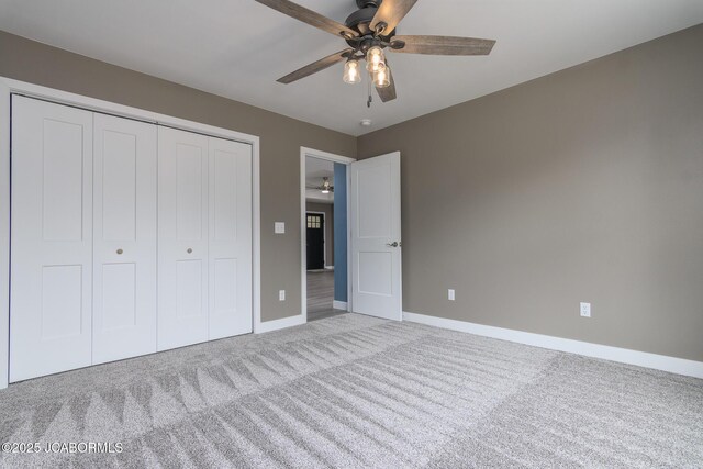 209 Gavin Ln, Linn, MO 65051 - unfurnished bedroom with carpet, a closet, and ceiling fan