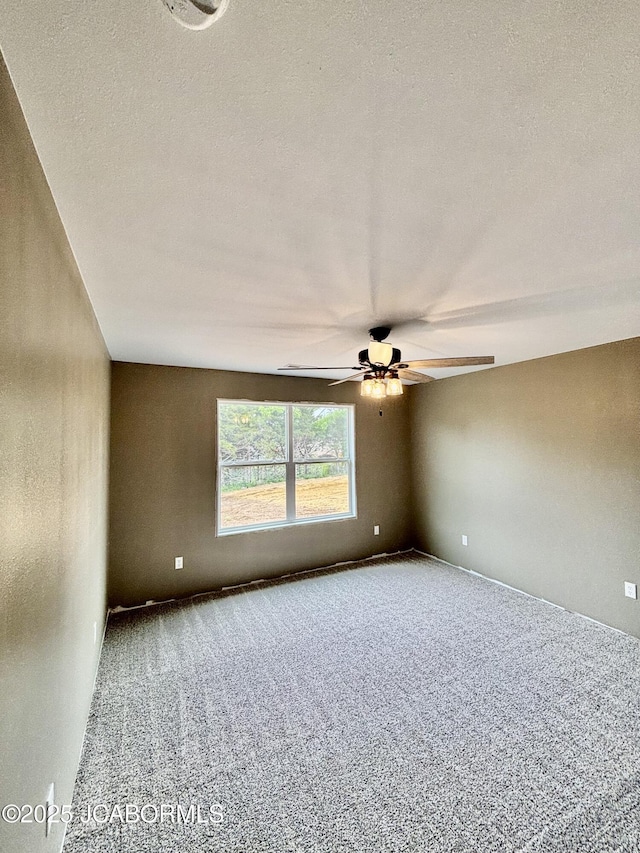 209 Gavin Ln, Linn, MO 65051 - carpeted empty room with ceiling fan and a textured ceiling