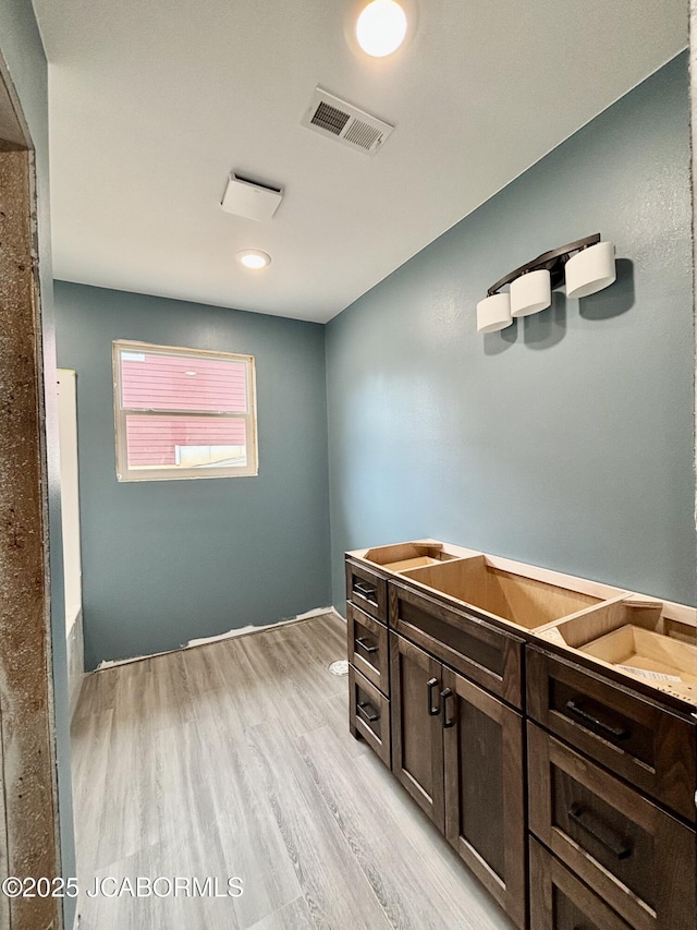 209 Gavin Ln, Linn, MO 65051 - full bathroom featuring wood finished floors and vanity