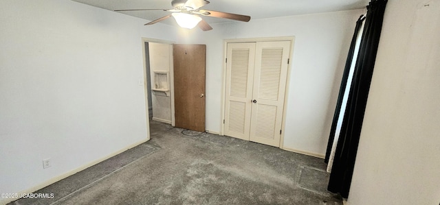 unfurnished bedroom with a closet, carpet flooring, and a ceiling fan