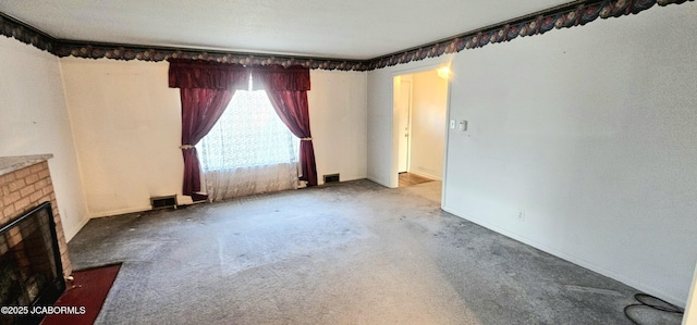 interior space featuring a fireplace and visible vents