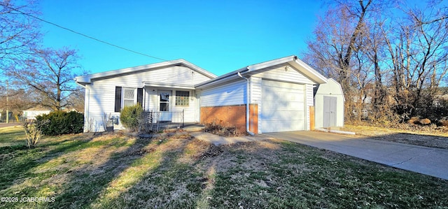 single story home featuring brick siding, driveway, and a garage