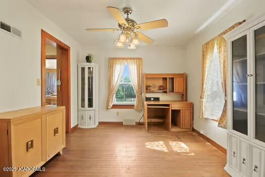 409 E 9th St, Fulton, MO 65251 - home office with a ceiling fan and light wood-type flooring