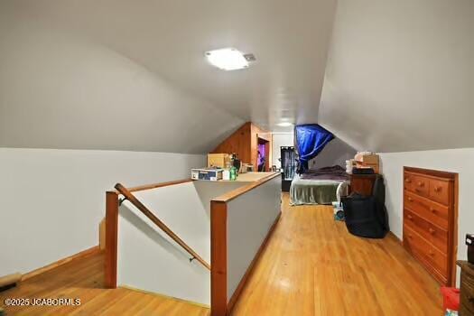 409 E 9th St, Fulton, MO 65251 - bonus room with light wood finished floors and vaulted ceiling
