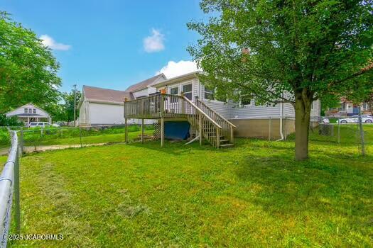 409 E 9th St, Fulton, MO 65251 - back of property with a deck and stairs