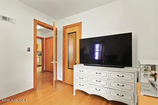 409 E 9th St, Fulton, MO 65251 - bedroom featuring light wood-style flooring